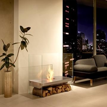 The Igloo freestanding designer bioethanol fireplace is made entirely of glass and stainless steel and burns bioethanol fuel which is a renewable energy source that burns clean and delivers warming heat. Portable Furniture, Mad Design, Fireplace Grate, Heater Cover, Ethanol Fireplace, Bioethanol Fireplace, Freestanding Fireplace, Real Fire, Traditional Fireplace