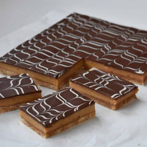 Caramel Slice with Marbled Chocolate Topping | Baking Envy Baking Envy, Caramel Slices, Chocolate Caramel Slice, Marbled Chocolate, Marble Chocolate, Chewy Caramel, Caramel Shortbread, Caramel Filling, Caramel Slice