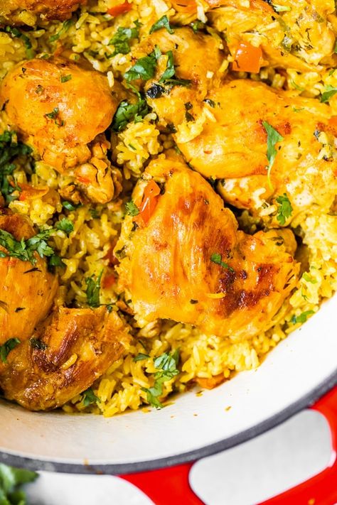 Authentic Arroz Con Pollo, or Latin chicken and rice, is the ultimate one-pot meal. It’s a classic Colombian dish that I grew up on that I now love to cook for my family. #arrozconpollo #authenticarrozconpollorecipe Foreign Cuisine, Boneless Chicken Thighs, Skinny Taste Recipes, Chicken And Rice, Ww Recipes, Adobo, Chicken Thigh Recipes, Biryani, Healthy Options