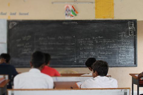 Blurred out writing on a classroom blackboard shows how poor vision can affect learning at school. Classroom With Students, Classroom Blackboard, A Classroom, A Pic, At School, Eye Care, Spectacles, Encouragement, Writing