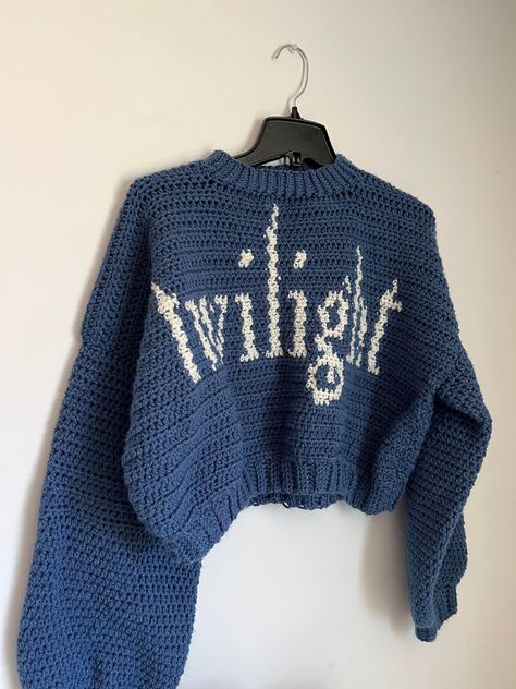 DISCLAIMER THIS IS A DIGITAL PRODUCT originally I made this sweater as a one time sweater for a trip to Washington. It was my child for at least 4 weeks and then I posted about it later in the months on a facebook group called 'twilight sh**posting' and everyone said I should make a pattern and THUS began my descent! I couldn't find twilight theme graphing patterns and this one was made and tested from a XS to a 3XL. If you are a 4XL-6XL please message me and I would love to have you test to be graded higher! About the listing:  this is a digital pattern that comes with the pdf and an excel sheet to automate those numbers for you! It is easy to use and even the document has pictures to help with navigating the excel sheet!  Materials:  5mm hook  weight 4 yarn two colors one for the base an Beginner Crochet Clothing Patterns Free, Crochet Sweater Template, Twilight Crochet Patterns, Lovejoy Crochet, Twilight Crafts Diy, Tapestry Crochet Sweater, Crochet Winter Sweater, Twilight Crochet, Crochet Sweater Ideas