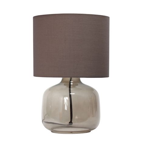 "Find the Simple Designs 14\" Glass Table Lamp with Gray Fabric Shade at Michaels. com. Illuminate your living space with this simple yet stylish glass table lamp. The glass jar shaped base and fabric drum shade is the perfect blend of charm to give your home a contemporary and modern upgrade. Illuminate your living space with this simple yet stylish glass table lamp. The glass jar shaped base and fabric drum shade is the perfect blend of charm to give your home a contemporary and modern upgrade Jar Table Lamp, Lamp Switch, Grey Table Lamps, Room Ambiance, Fabric Lampshade, Gray Fabric, Grey Glass, Glass Table Lamp, Drum Shade