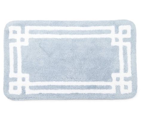 Create a spread of soft comfort on your bathroom floor with this elegant bath rug from Broyhill. Its plush pile showcases an interlaced double border design in white on a lovely blue background, for sophisticated style that stands out. Blue Bathroom Rugs, Coastal Room Decor, Blue Dorm, Dorm Bathroom, Cute Bath Mats, Elegant Bath, College Bedroom, College House, Blue Bath Mat