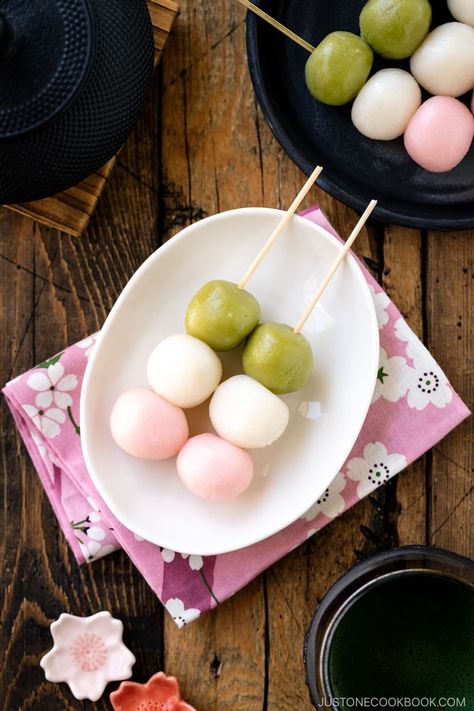 Made with sweetened rice balls on a skewer, Hanami Dango is a popular sweet enjoyed during the cherry blossom viewing in Japan. The dumplings come in three striking colors of pink, white, and green. A sweet start to the arrival of spring! #hanamidango #sanshokudango #dango | Easy Japanese Recipes at JustOneCookbook.com Dango Recipe, Hanami Dango, Pickled Cherries, Freezing Vegetables, Powdered Food Coloring, Sweet Red Bean Paste, Tokyo Aesthetic, Japanese Sweets Wagashi, Japanese Desserts