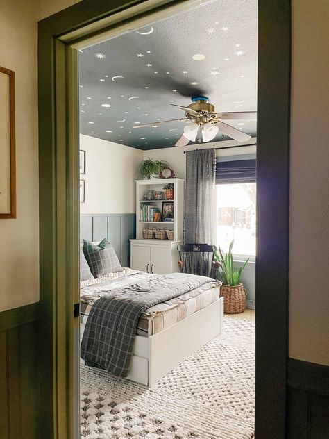 Cozy and Colorful Boy Bedroom Makeover with Simple DIY Board and Batten and blue painted ceiling with star decals Wainscoting Boys Bedroom, Painted Star Ceiling, Boy Room Makeover Ideas, Boy Bedroom Paint Colors, Blue Painted Ceiling, Boys Room Paint Ideas, Simple Boys Room, Diy Board And Batten Wall