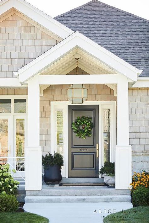 Suzanne Kasler Morris Lantern fitted above a black front door in a covered porch with a black border doormat and styled potted plants. House Front Porch, Porch Remodel, Farmhouse Front Door, Metal House Numbers, Front Porch Design, Cottage Exterior, Style Cottage, Casa Exterior, Farmhouse Front