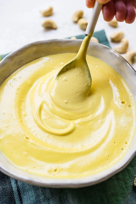 This easy vegan hollandaise sauce is just as smooth and rich as the traditional recipe. It's super flavorful, ultra creamy (thanks to the cashews), and easy to make with just 8 ingredients and no cook time! Vegan Hollandaise, Vegan Hollandaise Sauce, Vegan Pantry Staples, Vegan Breakfast Casserole, Recipe For Hollandaise Sauce, Crowded Kitchen, Vegan Pantry, Herb Roasted Potatoes, No Cook