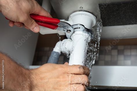 Stock Image: Plumber Fixing Sink Pipe With Adjustable Wrench Garbage Disposal Cleaner, Disposal Cleaner, Plumbing Companies, Commercial Plumbing, Emergency Water, Pipe Repair, Leak Repair, Plumbing Emergency, Plumbing Problems