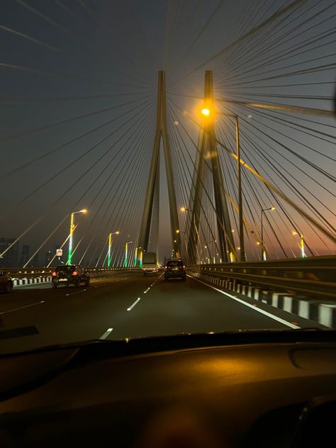 Roadtrip and sunset 🫠 #sunset #skyline #sky #roadtrip Worli Sea Link Night, Mumbai Snap, Mumbai Aesthetic, Car Songs, Marine Drive Mumbai, Bandra Worli Sea Link, Nightclub Aesthetic, Beach Video, Dump Ideas