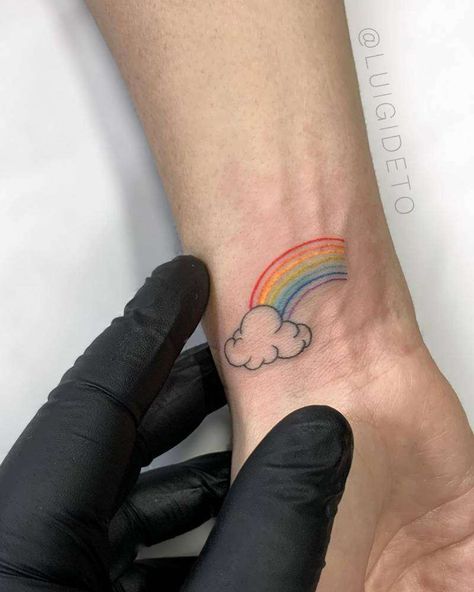 30 Best and Latest Rainbow Tattoo Ideas and Meanings 17 Rainbow Tattoos Pride, Rainbow Tattoo Ideas Unique, Rainbow Tattoo Ideas, Tattoo Ideas And Meanings, Rainbow Tattoo, Tattoo On Wrist, Tattoo Ideas Unique, Pride Tattoo, Tulip Tattoo