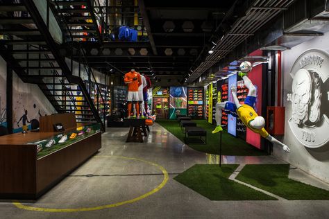 Nike Opens First Football-Only Store in Brasil Sport Retail Store Design, Distressed Brick, Soccer Post, Sportswear Store, Official Shoes, Soccer Store, Retail Interior Design, Sport Shop, Retail Inspiration