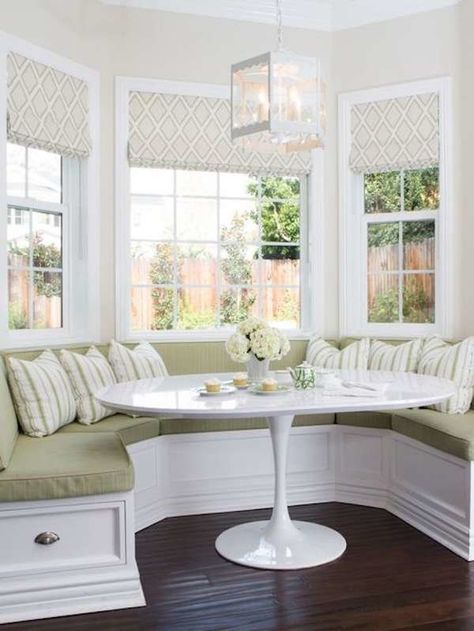 don't super love all the green, not as warm -but there is something appealing about this nook- the varying fabric and symmetry is appealing Bay Window Seating Kitchen, Seating In Kitchen, Breakfast Nook Bench, Kitchen Bay Window, Nook Bench, Window Seat Kitchen, Banquette Seating In Kitchen, Bay Window Seat, Built In Sofa