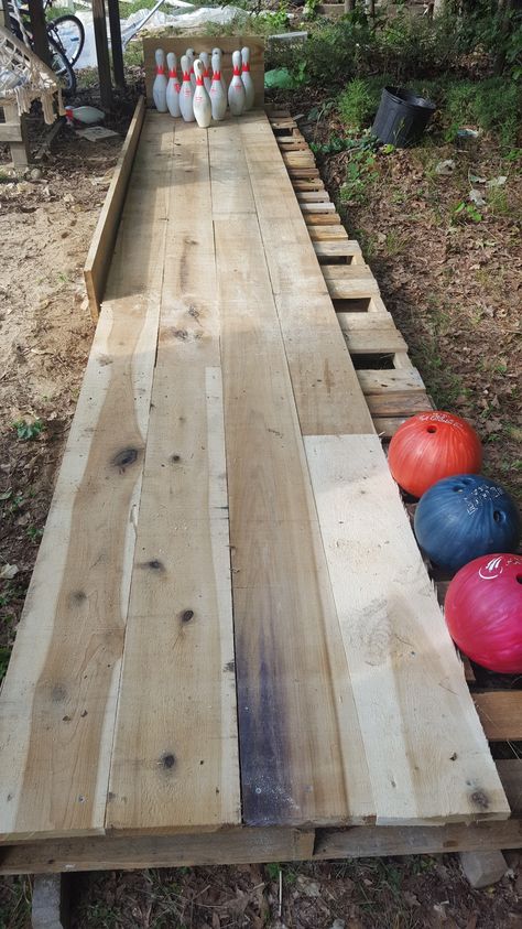 Outside Bowling Lane, Diy Outdoor Bowling, Outdoor Bowling Alley Diy, Backyard Bowling Alley Diy, Outdoor Farm Games, Outdoor Bowling Alley, Backyard Bowling Alley, Diy Bowling Alley, Backyard Bowling