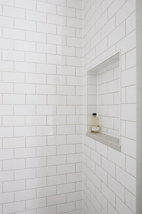 A Serene Bathroom Renovation - white subway tile with light gray grout Subway Tile Shower Niche Ideas, Subway Tile White Grout Bathroom, Light Gray Grout White Subway Tile, Shower Niche Ideas Subway Tile, Subway Tiles Shower White, White Subway Tile Shower Gray Grout, Bathroom White Tile Grey Grout, Subway Tile Gray Grout Bathroom, Best Lighting For Small Bathroom