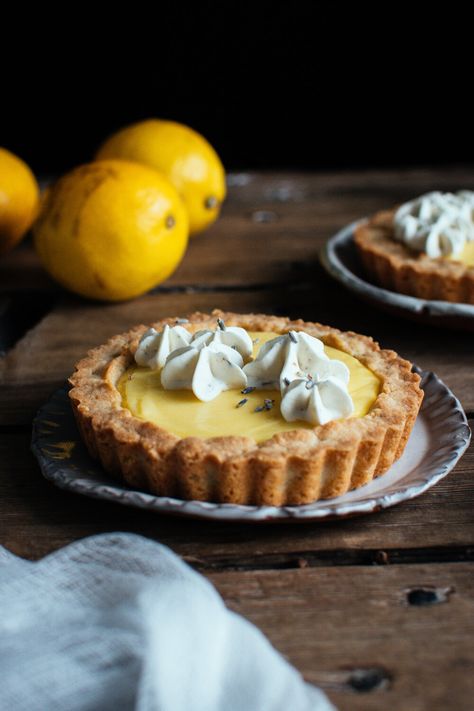 lemon lavender tarts — the farmer's daughter | let's bake something Lemon Sweets, Baking Lessons, Lavender Shortbread, Lemon Tarts, Lemon Tart Recipe, Mini Tart Pans, Bake Something, Culinary Lavender, Lemon Filling