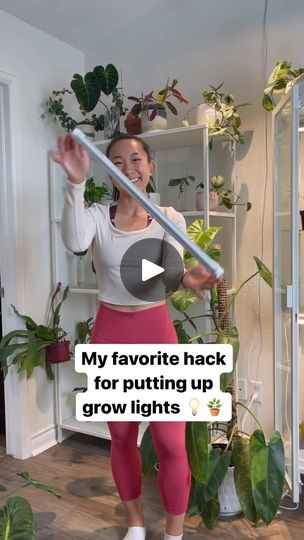 Indoor Garden Lighting Ideas, Wall Mounted Grow Light, Creative Ways To Hang Plants Indoors, Hanging Grow Lights Indoor, Tension Rod Plant Stand, Grow Light Set Up, Grow Light Ideas, Houseplant Hacks, Greenhouse Cabinet