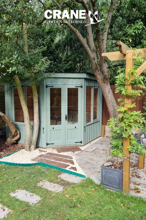 Orford National Trust Summerhouse painted in Terrace Green Summerhouses Garden Cabin, Corner Garden Office, Corner Garden Shed, Hidden Garden Shed, Corner Summer House Ideas, Corner Garden Room, Library Shed Backyards, Small Garden Office Ideas, Small Garden Summer House Ideas