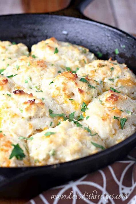 These soft, tender biscuits are loaded with cheddar cheese, chives and a hint of garlic. So easy to make, they're a perfect addition to almost any meal. Cajun Recipes Louisiana, Cheddar Drop Biscuits, Chive Dumplings, Drop Dumplings, Drop Biscuits Recipe, Garlic Cheddar, Baking Bread Recipes, Drop Biscuits, Easy Holiday Recipes