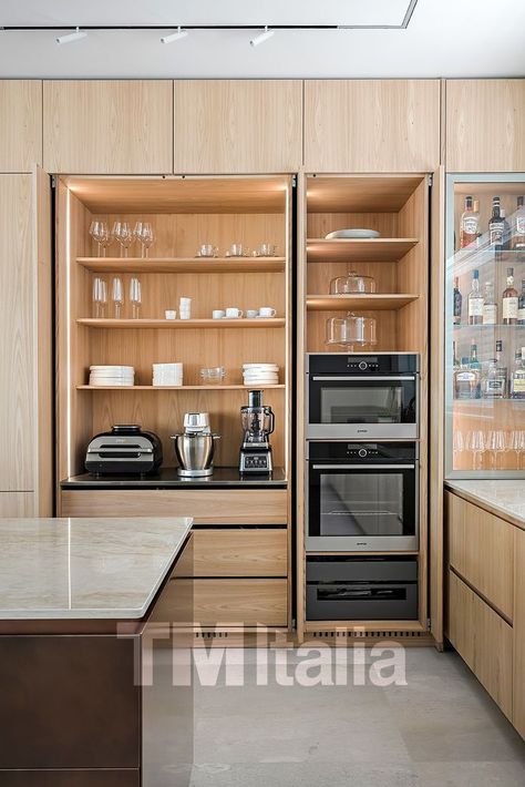 modern kitchen Hidden Wall Oven, Retractable Kitchen Cabinet Doors, Retractable Doors Kitchen, Slide And Hide Kitchen Doors, Fridge Unit Kitchen Designs, Concealed Appliances Kitchen, Pocket Doors Kitchen Cabinets, Hidden Fridge Cabinet, Kitchen Wall Of Cabinets