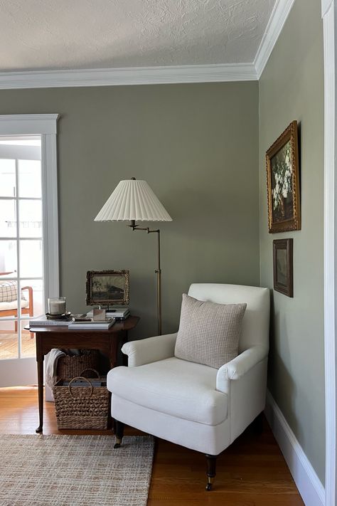 Arm chair and side table styling with coffee table books plus vintage art, living room corner reading nook #thescruffydoghouse #scruffydoginteriors #interiorinspo #interiors #vintage #interiordesign #vignette #decor #traditionalhome, #newenglandstyle #cottagecore Chair And Lamp In Corner, Living Room Reading Corner, Antique Reading Corner, Book Reading Chair Cozy Corner, Book Pages On Wall Bedroom Corner, Antique Corner Chair, Side Table Styling, Living Room Corner, Cozy Chair