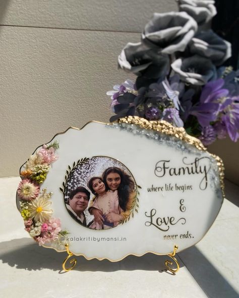 Family, where Life begins & Love never Ends🦋🙈🥹!! We are glad that we have added this beautiful frame in “ The Family” gift section , although family gifting is underrated!! Where @nehald85 ma’am ordered this one for her Bhai & Bhabhi …. , who lives abroad . [giftfor family , family time , floral gifts , unique gifts , gift ideas , resin frame , photo frame , resin frame with stand , desk frame , desk Gifts , desk accessories, table stand , frame with stand ] #resinart #resinphotoframe ... Resin Family Photo Frame, Mom And Dad Anniversary Gift, Photo Frame Resin Art, Family Photo Frame Ideas, Resin Photo Frame Ideas, Resin Art Photo Frame, Resin Gift Ideas, Resin Picture Frame, Photo Frame Heart