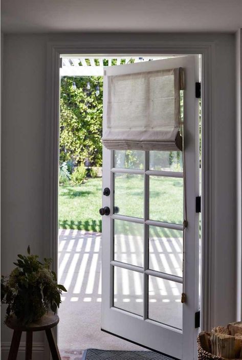 Elevate Your French Doors with Outside Mount Window Treatments | Everhem French Doors With Shades, Bedroom With Garden View French Doors, Door Treatments Interior, Roman Shades On French Doors, French Door Window Treatments Ideas, Privacy Film For Doors, Door Shades Ideas, Glass Door Shades, Farmhouse Window Treatments Kitchen