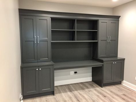 Black Office Built Ins With Desk, Cabinet And Desk Combo, Office Built Ins Using Stock Cabinets, Urbane Bronze Desk, Home Depot Office Cabinets, Den Cabinets Built Ins, Office Cupboard Design Cabinets, Edward Jones Office Ideas, Comfy Home Office Ideas