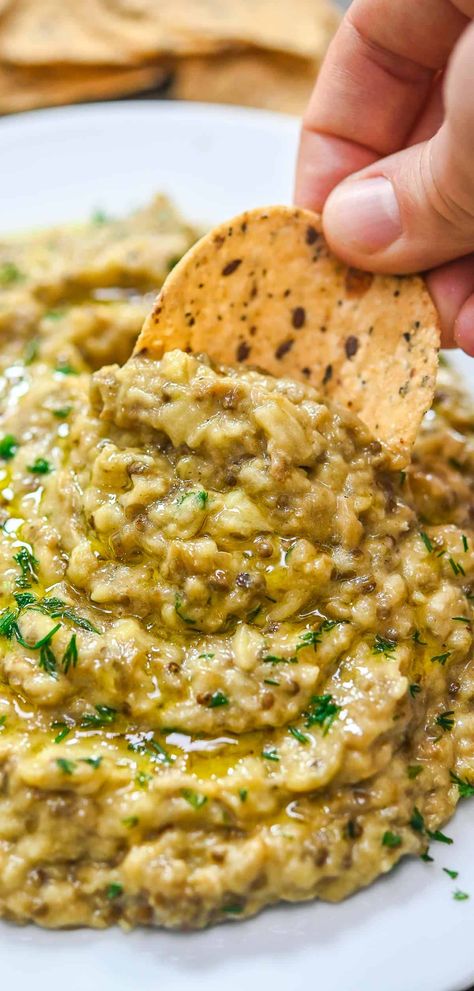 This Roasted Eggplant Dip is creamy, flavorful, and perfect for serving at parties or for a snack. This dish is so easy to make and tastes great with everything you serve it with. Creamy Eggplant, Baba Ghanoush Recipe, Eggplant Dip Recipes, Vegan Eggplant Parmesan, Chinese Chicken Salad Recipe, Babaganoush Recipe, Roasted Eggplant Dip, Stuffed Pepper Dip, Farmers Market Recipes