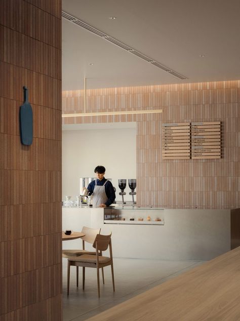 Locally produced tiles clad walls and table in Blue Bottle Coffee shop Parisian Style Interior, Brick Cafe, Keiji Ashizawa, Tile For Wall, Aesthetic Furniture, Wall Lamp Shades, Hotel Floor, Blue Bottle Coffee, Tile Manufacturers