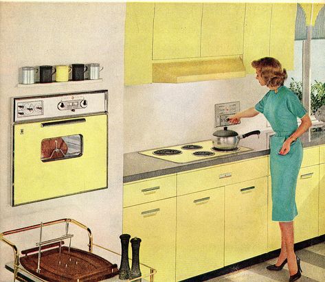 The yellow is actually elegant. Love that vintage tea service cart. Mcm Remodel, Yellow Kitchens, Retro Kitchens, 60s Design, Vintage Housewife, Vintage Kitchens, Retro Yellow, Vintage Appliances, Midcentury Home