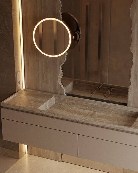 In this bathroom, just like in the bedroom, the centerpiece is a striking end-cut marble that frames the mirror, adding an element of raw elegance and sophisticated texture. We further enhanced the space with a magnifying mirror, complete with its own backlight, providing both functionality and a modern touch. The result is a harmonious blend of luxury and refinement, where every detail speaks of meticulous craftsmanship. ✨🪞 Design by #artpartnerarchitects #LuxuryInteriors #MarbleMagic #Mod... Art Partner, Magnifying Mirror, In Bathroom, Marble Wall, Led Lighting, The Mirror, The Space, Wall Mirror, Bathroom Design