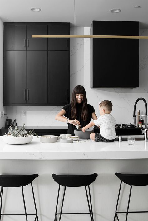 Home Tour: Black, White & Badass - Apartment34 Monochrome Kitchen, Minimal Monochrome, Wood Floor Pattern, White Apartment, Casa Loft, Wood Parquet Flooring, Kitchen Design Color, Appartement Design, Black And White Interior