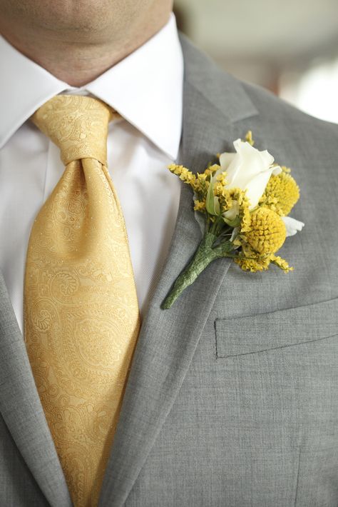 Yellow and gray were my wedding colors. My groom wore a gray suit with a yellow tie for our garden wedding. His boutonniere was done by Sky's the Limit florist with yellow billy balls and a white rose. White Tuxedo Wedding, Yellow Wedding Theme, Flowers For Men, Billy Balls, Yellow Wedding Flowers, Wedding Suits Groom, Yellow Tie, Tuxedo Wedding, Groom Wear