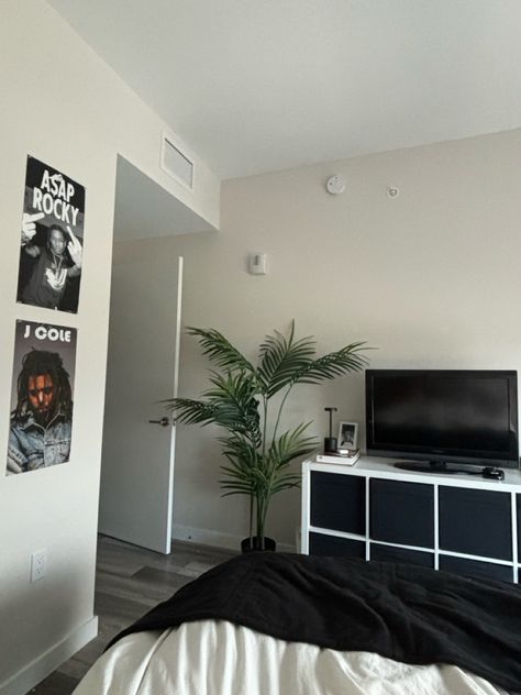 #aesthetic #rapper #posters #bedroom #bedroomideas #blackandwhiteaesthetic #plants #minimalist Boho Bedroom Men, Minimalist Bedroom Tv Wall, Monochrome Bedroom Aesthetic, Rapper Bedroom, Hype Beast Apartment, Boys Room Ideas Teenagers Teen Bedroom, Black And White Bedroom Ideas Cozy, Grey Aesthetic Room, Male Room Aesthetic