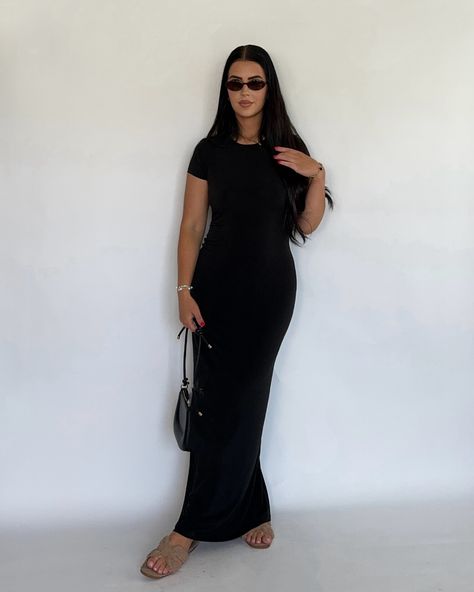 Set your alarms for FRIDAY to snag this dress that your wardrobe absolutely needs 🖤 she is a perfect year round piece! Black Maxi Dress Outfit Ideas Casual, Bodycon Maxi Dress Outfit, Maxi Dress With Sandals, Black Maxi Bodycon Dress, Long Black Dress Casual, Long Black Dress Outfit, T Shirt Maxi Dress, Black Maxi Dress Outfit, Black Dress Outfit Casual