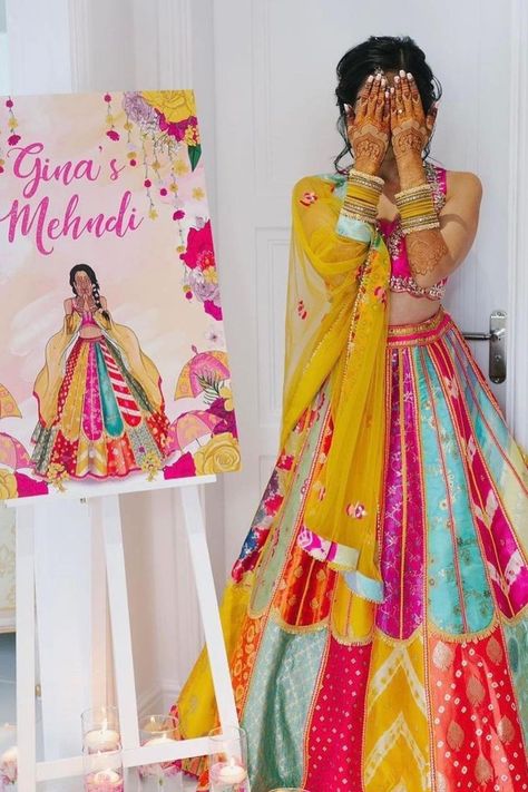 We are obssessed with how this bride’s mehendi artwork is replicating her mehendi day look ! Always dreamed of your Mehndi to be a colorful, boisterous affair? Well, you don't always need an OTT decor to spread that vivaciousness & quirk, when your attire can do the magic. Why dress basic even if it is an intimate, low-key celebration? Pastel, Haldi Ceremony Outfit, Haldi Dress, Mehndi Outfit, Haldi Outfits, Haldi Outfit, Mehendi Outfits, Lehenga Designs Simple, Wedding Lehenga Designs