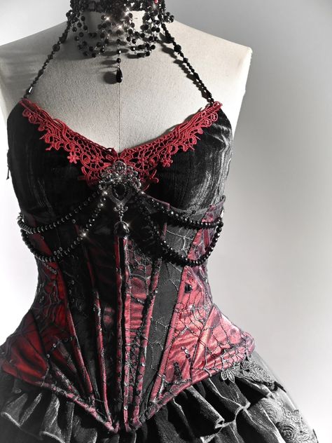 Exquisite Handmade Beaded Halter Neck Corset Top with Red Lace Applique – Featuring a V-Shaped Neckline and Slim Fit for a Captivating Vampire Look.   	 		 			Size 			S 			M 			L 			XL 		 		 			Bust 			83 			87 			91 			95 		 		 			Waist 			66 			70 			74 			78 		 		 			Hem Circumference 			74 			78 			82 			86 Dnd Clothes, Spiderweb Lace, Velvet Corset Top, Modern Mythology, Red Vampire, Red And Black Corset, Gothic Spider, Goth Fits, Vampire Fashion