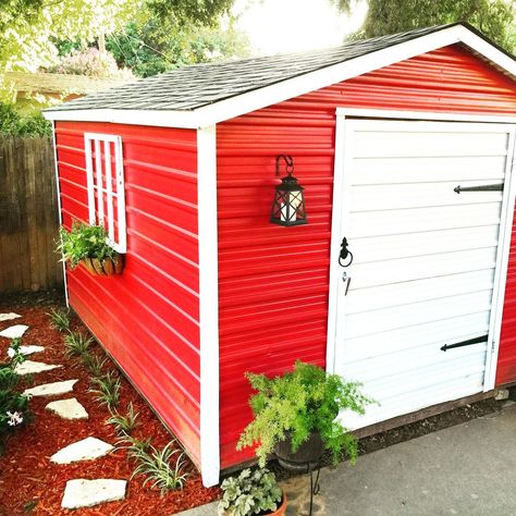 My wife wanted to update our old metal shed for a long time. We made a plan to go with a "red barn" look. We added paint, an old window, a flower box, fake hing… White Shed, Red Wall Paint, Shed Landscaping, Shed Makeover, Pool Shed, Tin Shed, Shed Decor, Shed Organization, Backyard Sheds