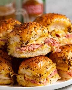 Hot Ham and Cheese Sliders - RecipeTin Eats Ham And Cheese Baked, American Food Party, Hot Ham And Cheese Sliders, Hot Ham Sandwiches, Ham Sliders Recipes, Ham Cheese Rolls, Hot Ham And Cheese, Soft Rolls, Ham Cheese Sliders