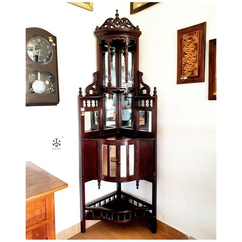 . . Colonial corners crown mirror art deco display cabinet, fully handmade burmese teak wood collectible in dark wood stain, makes a great collectible and decor prop, perfect for home corners and conjunction spaces, perfect to display artistic pieces, decor stuff, in great condition. . . Dimensions 81.25 inches tall 28 inches wide 20 inches deep . . 🏷 Now on Sale. 🛒 Buy from our Website, Link in Bio. 📦 Shipping cost extra as applies 🌎 Paid International Shipping 🚫 No Exchange/No Returns... Colonial Furniture, Dark Wood Stain, Art Deco Mirror, Corner House, Wood Stain, Mirror Art, Website Link, Burmese, Wood Chair