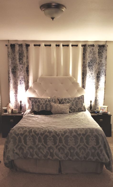 Curtains behind headboard Diy Headboard Ideas With Curtains, Curtain As Headboard, Curtains Behind Headboard Bedroom, Curtain Backdrop Bedroom, King Bed Covering Windows, Bed Behind Curtains, Headboard Curtains Backdrops, Curtains For Headboard Ideas, Curtains Behind Bed No Headboard