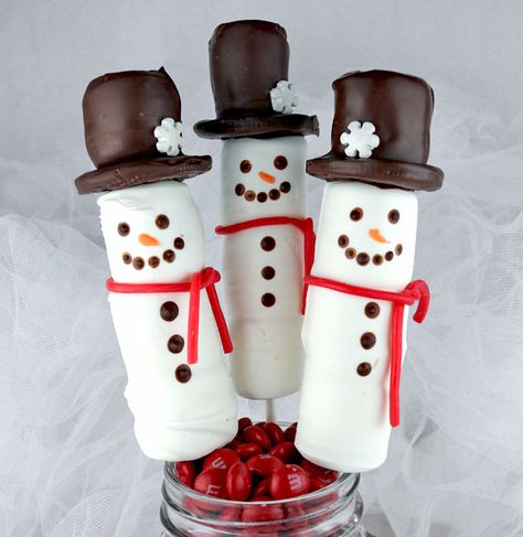 30 Fun Marshmallow Snowman Recipes How To Make Snowman, Marshmallows On A Stick, Snowman Recipes, Marshmallow Snowmen, Holiday Goals, Christmas Food Ideas, Marshmallow Desserts, Oreo Stuffed Chocolate Chip Cookies, Wilton Candy Melts