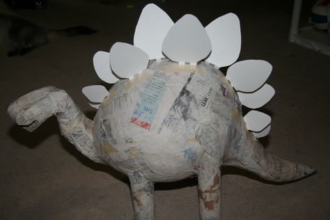 There are lots of ways to make a stegosaurus piñata. If you do an Internet search you’ll see many different stegosaurus piñatas.  This is how Kerry and I made ours. Paper Mache Pinata, Dinosaur Projects, Piñata Ideas, Dinosaur Themed Birthday Party, Diy Pinata, Dinosaur Crafts, Paper Mache Art, Paper Mache Crafts, Dino Birthday