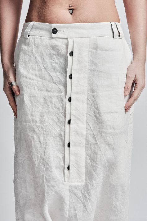 "Off-White Drop Crotch Boiled Linen Trousers with Buttons__ // EXPRESS DELIVERY ONLY __Semi Visible Front Closure with Black Buttons __3 Front & 2 Back Pockets __Fully Completed Bound Seams __Elastic Backside Waistband model__ bust 92 (36\"), waist 72 (28\"), hips 102 (40\"), biceps 28 (11''), height 177 (5'8\"), kg 65 (143 lbs) model wears size M | color: off-white fabric__ 100 linen care__ dry cleaning do not bleach do not tumble dry do not iron to keep wrinkle effect sizing__ size XS (US Low Crotch Pants, Off White Pants, Winter Trousers, Linen Coat, Collarless Shirt, Pants Linen, Drop Crotch Pants, Designs For Dresses, Linen Trousers