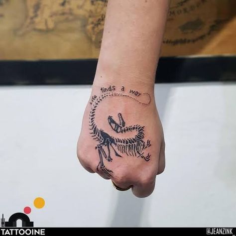 Dino Bones Tattoo, Dinosaur Hand Tattoo, Ghost Dinosaur Tattoo, Life Finds A Way Tattoo, Twdg Tattoo, Jurassic Park Tattoo Ideas, Jurrasic Park Tattoo, Land Before Time Tattoo, Fossil Tattoo