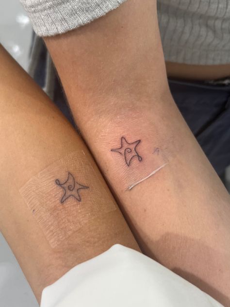 me and lauren got tattoos yesterday. completely impulsive Matching Tattoo Inspiration, Tattoo Idea Matching, 4 Group Tattoo Ideas, Sister Meaningful Tattoos, Lovers Matching Tattoos, Matching Tattoo Placement Ideas, Whimsical Matching Tattoos, Roommate Tattoos Matching College, Correlating Tattoos Friends