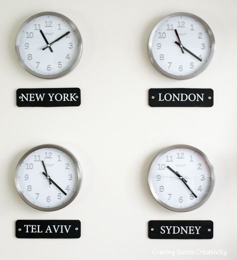 How to make a World Clock Wall Gallery Display with a few simple tools. Includes tips and tricks for picking the right clocks and making city labels. Wall Of Clocks Decor, Wall Clock Time Zones, Wall With Clock, Diy Wall Clock Ideas, Clock On Wall, Wall Clock Display, Simple Gallery Wall, Time Zone Clocks, Masculine Office