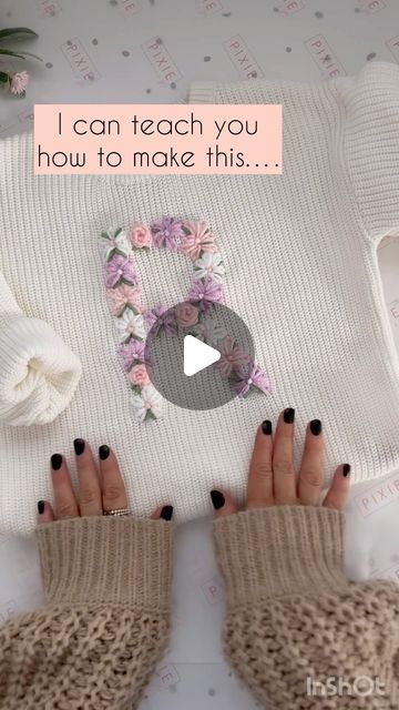 How To Make Embroidered Flowers, Embroidery With Wool Yarn, Embroidery With Yarn Letters, Hand Embroidered Daisy, Baby Sweater Embroidery Name Diy, Chain Stitch Embroidery Sweater, How To Embroider Flowers On Sweater, Yarn Embroidery Flowers, How To Yarn Embroidery On Sweater