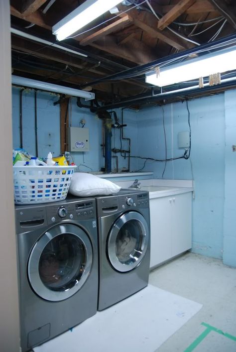 Showcase Unfinished Laundry Room, Unfinished Basement Laundry, Basement Laundry Room Makeover, Vintage Laundry Room Decor, Laundry Room Lighting, Vintage Laundry Room, Basement Laundry Room, Laundry Room Flooring, Basement Laundry