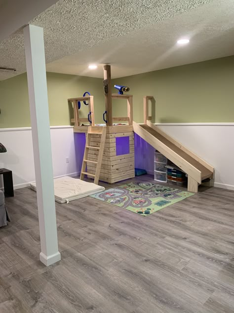 Playroom Playhouse With Slide, Playroom Ideas With Slide, Basement Play Structure, Indoor Playhouse With Slide, Basement Slide, Playroom Treehouse, Diy Indoor Playground, Indoor Playground Diy, Small Indoor Playground